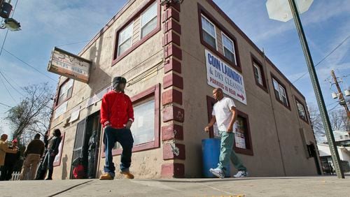 The notorious Pink Store on McDaniel Street, pictured here in 2012, has been the scene of two murders in two months. Police recently launched an effort to “take back” the corner. JONN SPINK / JSPINK@AJC.COM