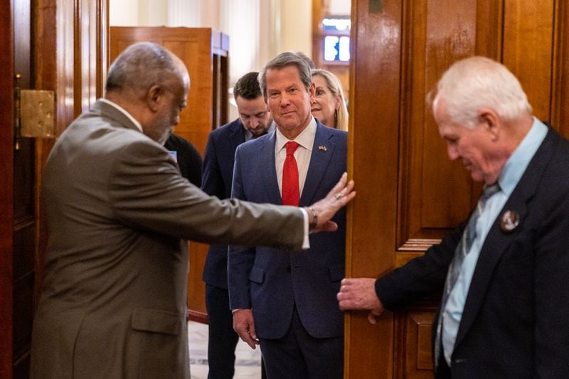 Gov. Brian Kemp waits to address the House of Representatives at the Capitol in Atlanta on Sine Die, the last day of the legislative session.