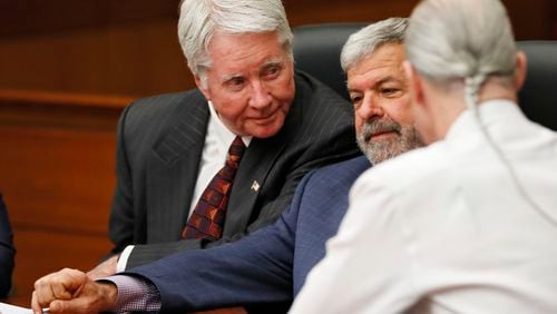 4/23/18 - Atlanta -  Tex McIver (left), defense attorneys Don Samuel and Bruce Harvey talk during court discussion on giving the jurors an Allen charge, encouraging a deadlocked jury to reach a verdict, after jurors in the Claud "Tex" McIver trial say they "don't see a path" to overcome their differences on the defendant's intent for all but one of the five counts, including malice murder. The jury resumed their fifth day of deliberations this morning during the Tex McIver murder trial at the Fulton County Courthouse.   Bob Andres bandres@ajc.com