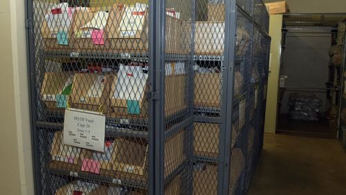 Rape kits are shown in the secure vault at the Georgia Bureau of Investigation. KENT D. JOHNSON/KDJOHNSON@AJC.COM
