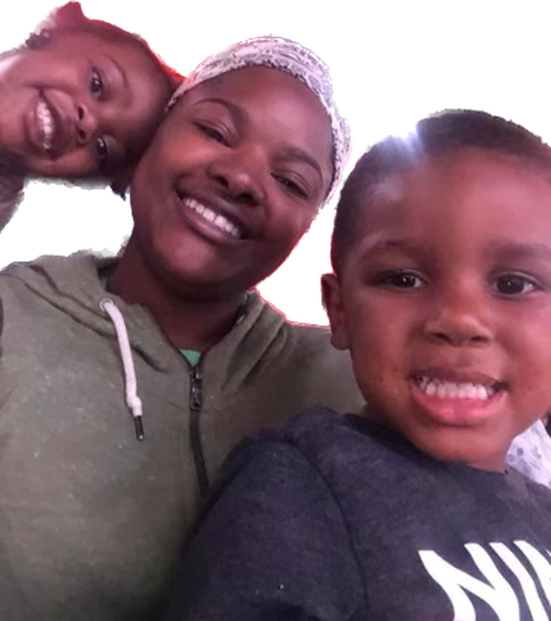 Marrisha Kindred posed with her two older children, Rylee (left) and Ayden (right), before she died with COVID-19 on Sept. 23, 2021. (Courtesy of family)