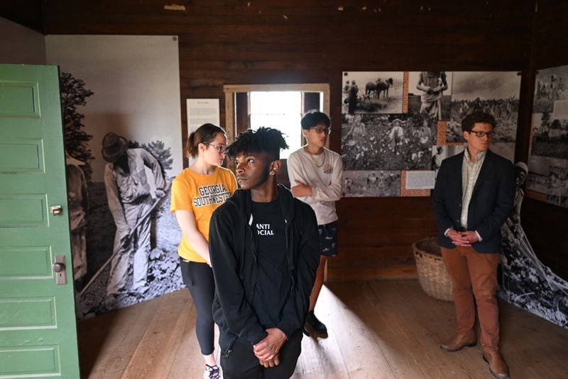 Georgia Southwestern State University students join their professor on a tour of a home at the Jimmy Carter Boyhood Farm. (Washington Post photo by Matt McClain)