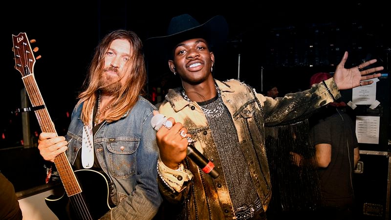 Billy Ray Cyrus (L) and Lil Nas X pose backstage during the 2019 Stagecoach Festival at Empire Polo Field on April 28, 2019 in Indio, California.