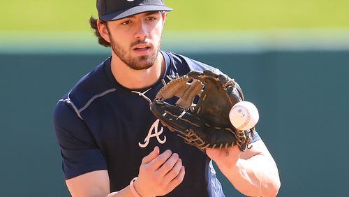 Braves top prospect infielder Dansby Swanson fields a grounder during spring training at Braves' camp in Lake Buena Vista, Fla. (Curtis Compton / ccompton@ajc.com)