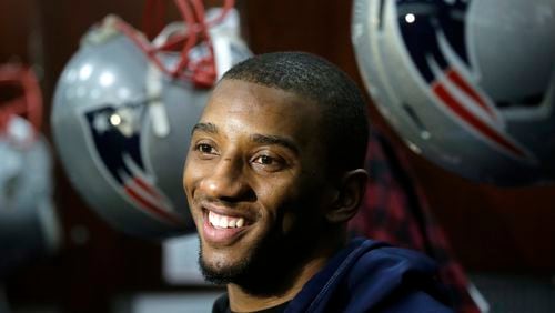 New England Patriots wide receiver Malcolm Mitchell speaks with members of the media in the team's locker room following an NFL football team practice, Thursday, Jan. 26, 2017, in Foxborough, Mass. The Patriots are to play the Atlanta Falcons in Super Bowl LI, Feb. 5, 2017, in Houston. (AP Photo/Steven Senne)