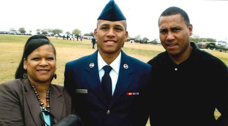 Anthony Hill and his parents - Anthony Hill Sr. and Carolyn Baylor-Giummo.