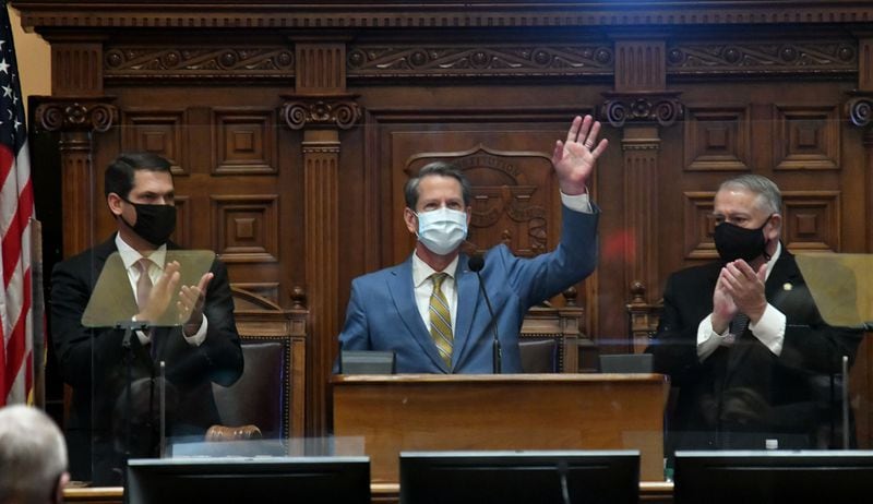 Gov. Brian Kemp waves before he delivers the State of the State Address to lawmakers in the House Chambers on Thursday, Jan. 14, 2021. (Hyosub Shin / Hyosub.Shin@ajc.com)