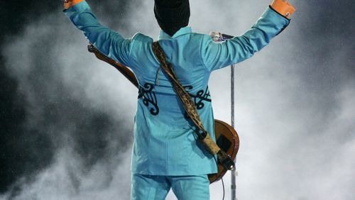In this Feb. 4, 2007 file photo, Prince performs during the halftime show at Super Bowl XLI Photo: AP