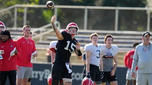 Georgia quarterback Carson Beck (15) does drills as the team prepares for the Orange Bowl NCAA college football game, Wednesday, Dec. 27, 2023, in Miami. Georgia is scheduled to play Florida State in the Orange Bowl Saturday at Hard Rock Stadium in Miami Gardens. (AP Photo/Lynne Sladky)