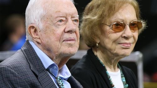 Former president Jimmy Carter and first lady Rosalynn Carter on the sidelines for a Falcons NFL football game on Sunday, Sept 30, 2018, in Atlanta.   Curtis Compton/ccompton@ajc.com