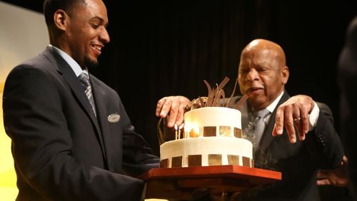 U.S. Rep. John Lewis, D-Atlanta, is presented a cake in February the day before his birthday at the Hyatt Regency Hotel’s Heritage Celebration in Atlanta. Lewis’ birthday has been used as a reason for a fundraiser in years when his age is divisible by five. In 2015, a fundraising celebration was held at the Tabernacle in Atlanta, with Jennifer Holliday and Regina Belle as the entertainment. Lewis’ campaign spent roughly $75,000 on the venue, staffing and staging; close to $30,000 on catering; and an additional $50,000 it paid to the producer for developing the gala’s “overall artistic vision.” The event raised roughly $250,000. (HENRY TAYLOR / HENRY.TAYLOR@AJC.COM)