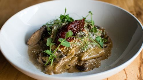 Silk Handkerchief Pasta, which comes with roasted wild mushrooms, porcini cream, tomato marmalade and cotija cheese, has been on the menu since the beginning at Better Half. CONTRIBUTED BY HENRI HOLLIS