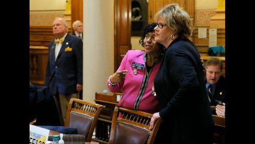 2/7/18 - Atlanta - Senator Renee Unterman (right), R - Buford, and Senator Valencia Seay, R - Riverdale, watch the vote come in for SB 352, which Underman sponsored, one of two omnibus bills the senate passed today that aim to get control of the opioid crisis in Georgia. BOB ANDRES /BANDRES@AJC.COM