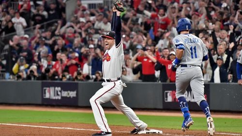 Braves first baseman Freddie Freeman reacts after recording the final out to beat the Dodgers and send the Braves to the World Series. Hyosub Shin / Hyosub.Shin@ajc.com