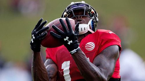 Falcons receiver Julio Jones makes a catch during Wednesday's training camp practice. It was the first live action this summer for the All-Pro receiver, who had foot surgery in the offseason.