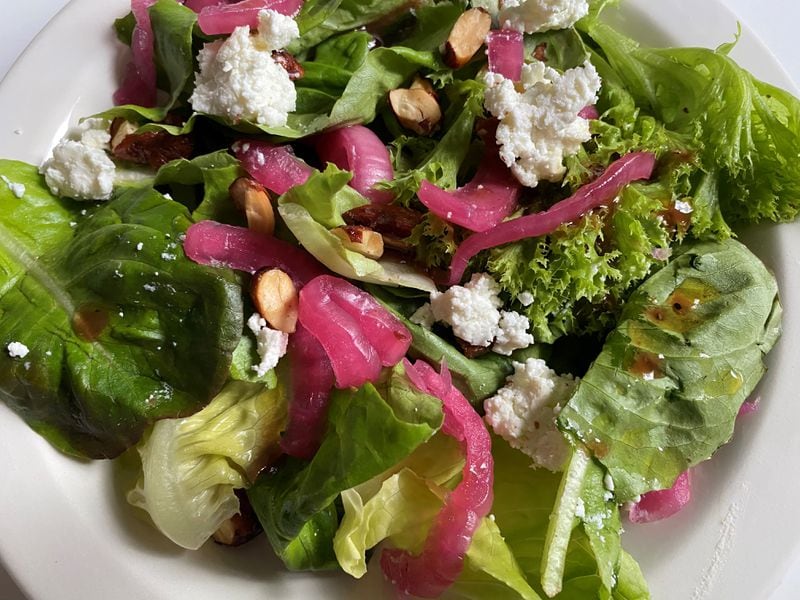 Serpas True Food House Salad with local greens, goat cheese, candied pecans, blistered grape vinaigrette. 
Bob Townsend for The Atlanta Journal-Constitution