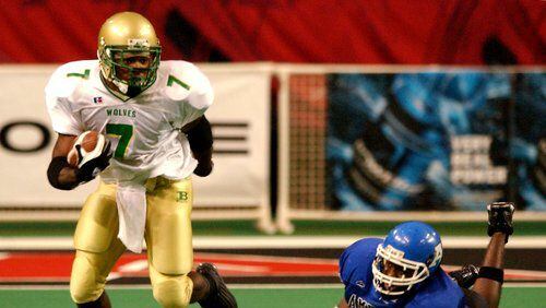 Darius Walker was an all-state running back for Buford when the Wolves won 47 consecutive games from 2001 to 2004.