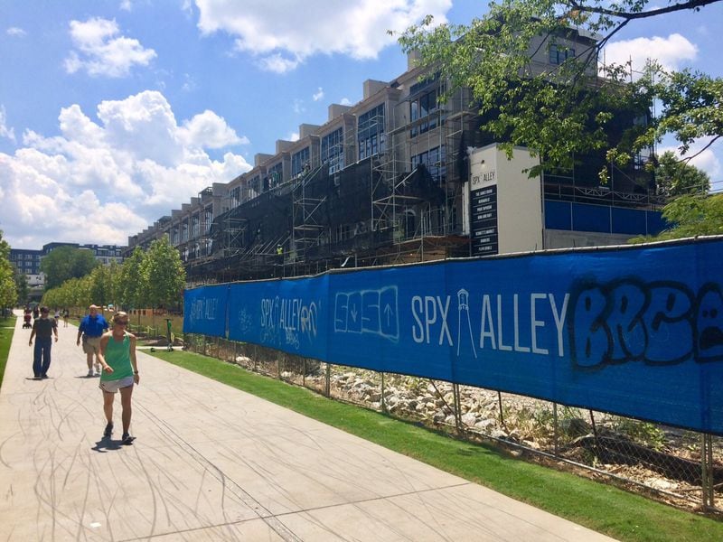 Just to the south of where a hotel would be built near the Beltline is a string of new pubs, eateries and a yoga studio. BILL TORPY / BTORPY@AJC.COM
