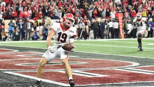 Georgia tight end Brock Bowers reacts after scoring a touchdown in the 4th quarter during the 2022 College Football Playoff National Championship Game at Lucas Oil Stadium in Indianapolis on Monday, January 10, 2022. (Hyosub Shin / Hyosub.Shin@ajc.com)