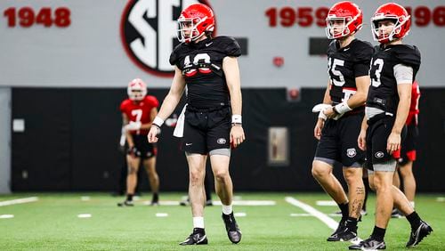Georgia fans are likely to see a lot of quarterbacks play in Saturday's G-Day Game, some they'd seen before like JT Daniels (18)and Stetson Bennett (13), and others like Carson Beck (15), whom they have not. (Photo by Tony Walsh/UGA Athletics)