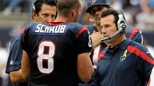 Houston Texans coach Gary Kubiak, right, talks with quarterback Matt Schaub (8) in the third quarter of an NFL football game against the Cleveland Browns on Sunday, Nov. 6, 2011, in Houston. (AP Photo/Dave Einsel)