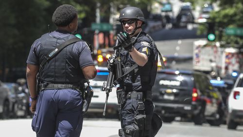 Atlanta police and other law enforcement agencies swarmed Midtown Atlanta on Wednesday after five people were shot.