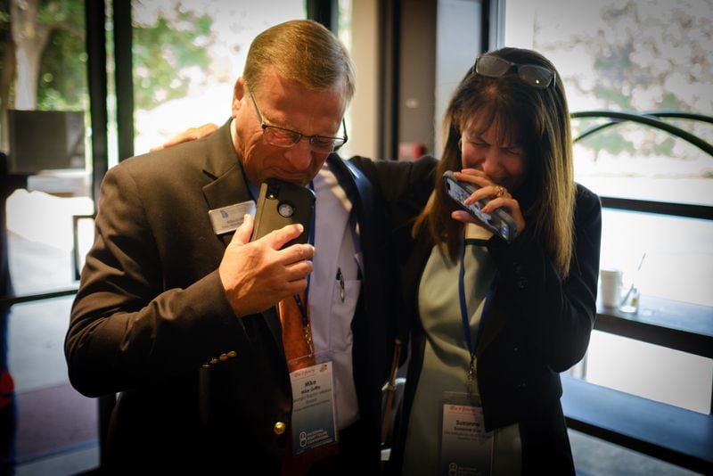 (L-R) Mike Griffin and Suzanne Guy react to the Supreme Court decision overturning Roe V. Wade at the The National Right to Life Convention at the Airport Marriott Hotel in Atlanta on Friday, June 24, 2022. (Arvin Temkar / arvin.temkar@ajc.com)