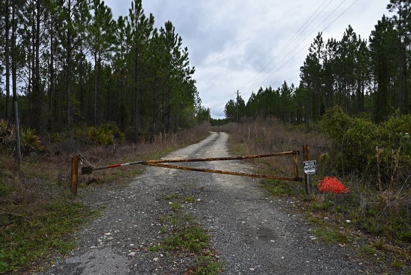 A rusty old gate blocks the entrance to the Twin Pines mine site in Charlton County, where digging equipment is being set up for a major new mining operation near the edge of the Okefenokee Swamp in South Georgia. Staff photo by Hyosub Shin / Hyosub.Shin@ajc.com