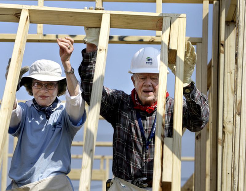President Jimmy Carter and former first lady Rosalynn Carter raise a wall as they help build a Habitat for Humanity house in Violet, Louisiana, in 2007. (AP Photo/Alex Brandon)
