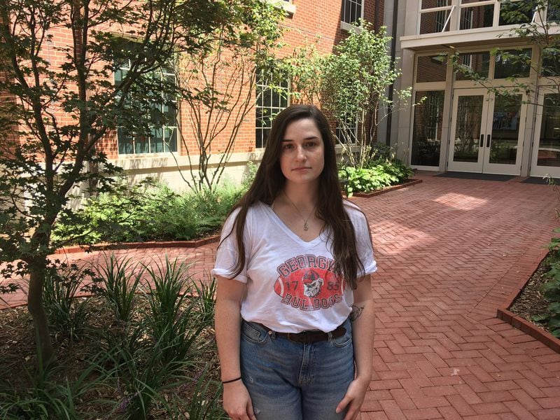 University of Georgia student Jessica Douglas stands in a new courtyard entrance near Baldwin Hall where slave remains were discovered in 2015. Douglas is among a group student leaders pushing for UGA to acknowledge its historic ties to slavery. BRAD SCHRADE/bschrade@ajc.com.