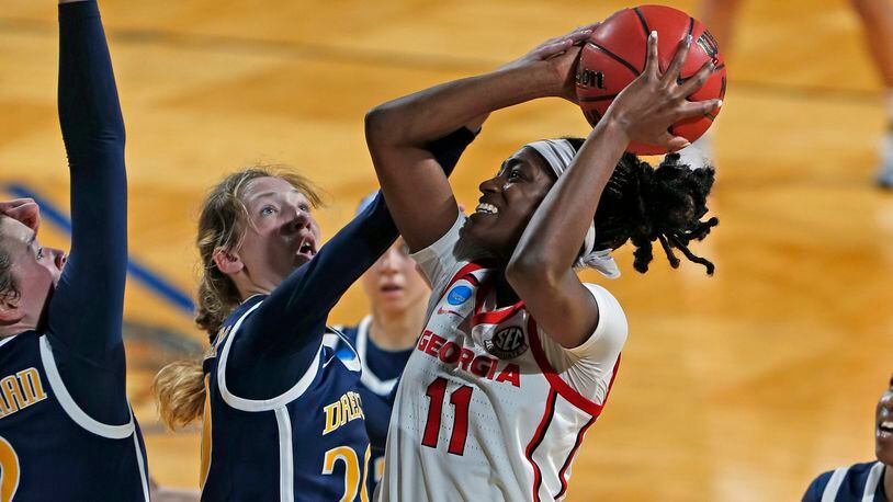 Georgia guard Maya Caldwell (11) shoots over Drexel forward Kate Connolly (20) during their first-round game of the women's NCAA tournament Monday, March 22, 2021, at the Greehey Arena in San Antonio, Texas. (Ronald Cortes/AP)
