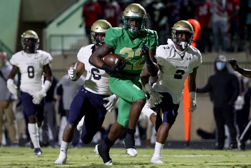 Buford running back Gabe Ervin (22) scores a touchdown after a reception against Dacula in the first half at Buford high school Friday, November 20, 2020 in Buford, Ga.