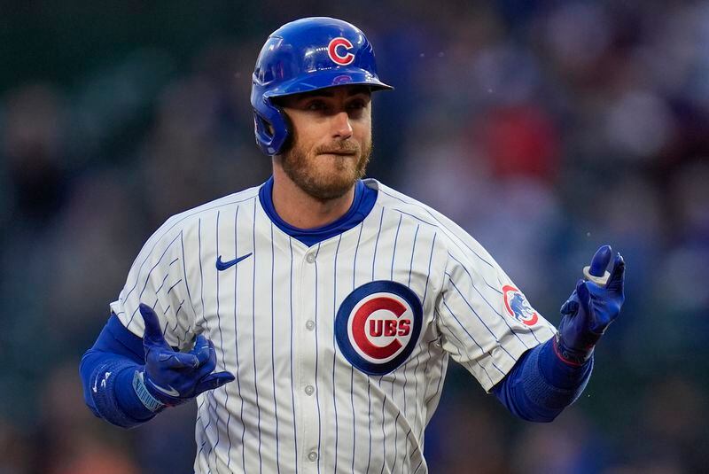 Chicago Cubs' Cody Bellinger runs the bases after hitting a home run during the first inning of a baseball game against the Houston Astros, Tuesday, April 23, 2024, in Chicago. (AP Photo/Erin Hooley)