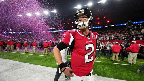 A scene to be scrubbed from memory as Falcons training camp opens: Matt Ryan walks off the field in Houston after the stunning 34-28 Super Bowl loss to New England. (Tom Pennington/Getty Images)