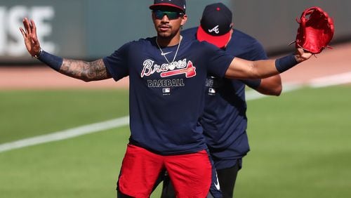 071320 Atlanta: Atlanta Braves infielder Johan Camargo works third base during batting practice as the team prepares to play a intrasquad game on Monday July 13, 2020 in Atlanta. The game is the first extended telecast of the team in action since the coronavirus pandemic shut down spring training in March.  Curtis Compton ccompton@ajc.com