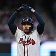Atlanta Braves catcher Travis d'Arnaud (16) celebrates after hitting a double during the fourth inning at Truist Park in Atlanta on Tuesday, April 23, 2024. (Hyosub Shin / AJC)