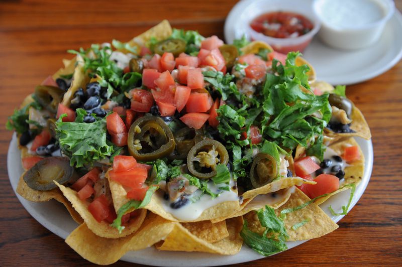Manuel’s Tavern ‘Welcome Back’ black bean nachos with salsa and sour cream. (BECKY STEIN PHOTOGRAPHY)