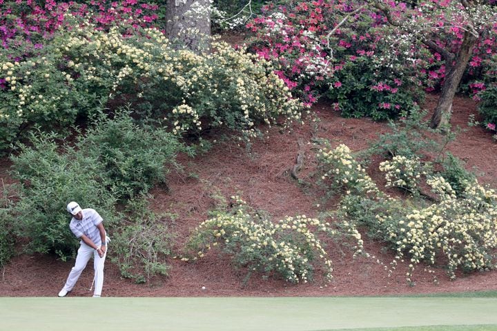 April 8, 2021, Augusta: Hideki Matsuyama chips from off of the twelfth green during the first round of the Masters at Augusta National Golf Club on Thursday, April 8, 2021, in Augusta. Curtis Compton/ccompton@ajc.com