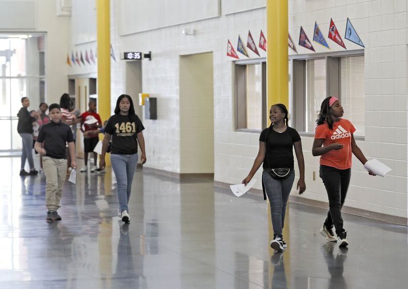 Students participate in a scavenger hunt that helps them learn the layout of the school. Incoming sixth-graders at Sylvan Hills Middle School take part in the summer bridge program designed to help students leaving elementary school adjust to their new life as middle schoolers. BOB ANDRES / ROBERT.ANDRES@AJC.COM