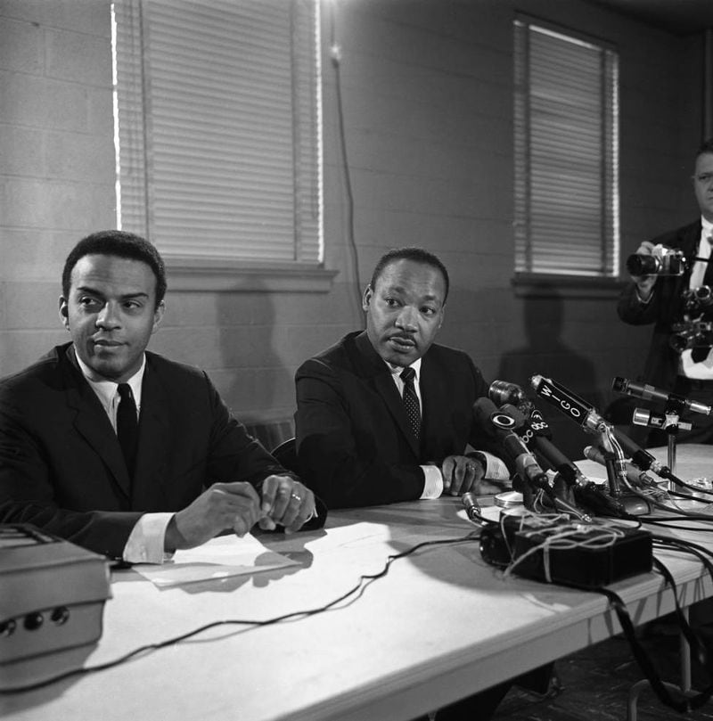 Andrew Young, then the SCLC leader, and Martin Luther King Jr. at a press conference in 1967. Bob Dendy/AJC file