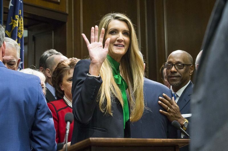 Newly appointed U.S. Sen. Kelly Loeffler waves toward supporters following a press conference in the Governor’s office at the Georgia State Capitol Building, Dec. 4, 2019. Gov. Brian Kemp appointed Loeffler to take the place of U.S. Sen. Johnny Isakson, who is stepping down for health reasons. An AJC analysis of public records and securities filings shows Loeffler and her husband, Intercontinental Exchange CEO Jeff Sprecher, are worth at least $500 million. ALYSSA POINTER / ALYSSA.POINTER@AJC.COM