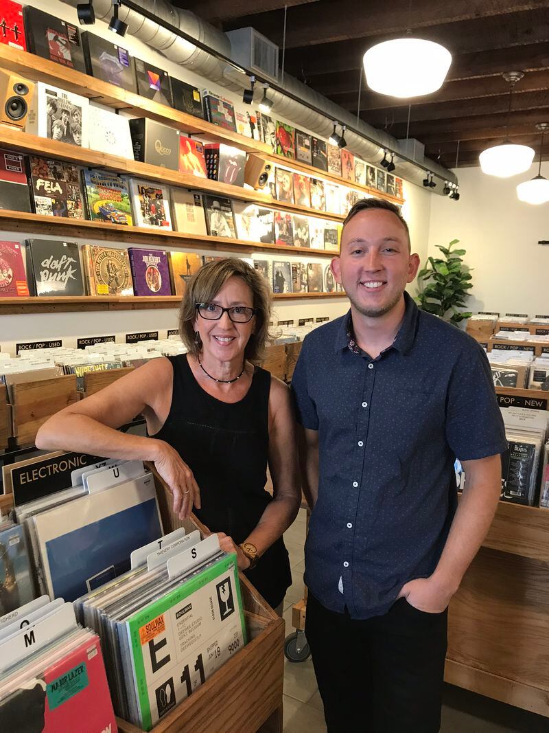 Karen and Alex Vernon, owners of Alpharetta's Comeback Vinyl. CREDIT: Rodney Ho/rho@ajc.com
