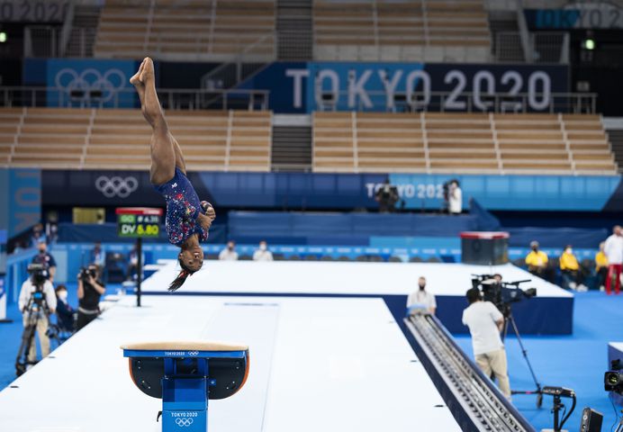 Simone Biles, of the United States, competes on the vault at the delayed 2020 Olympics in Tokyo, July 25, 2021. (Doug Mills/The New York Times)