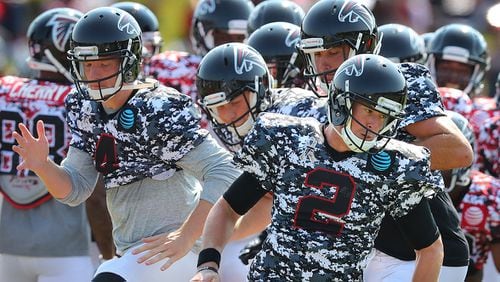 Falcons quarterback Matt Ryan leads the team through a agility drill during Military Day at team practice on Sunday, August 6, 2017, in Flowery Branch. Curtis Compton/ccompton@ajc.com