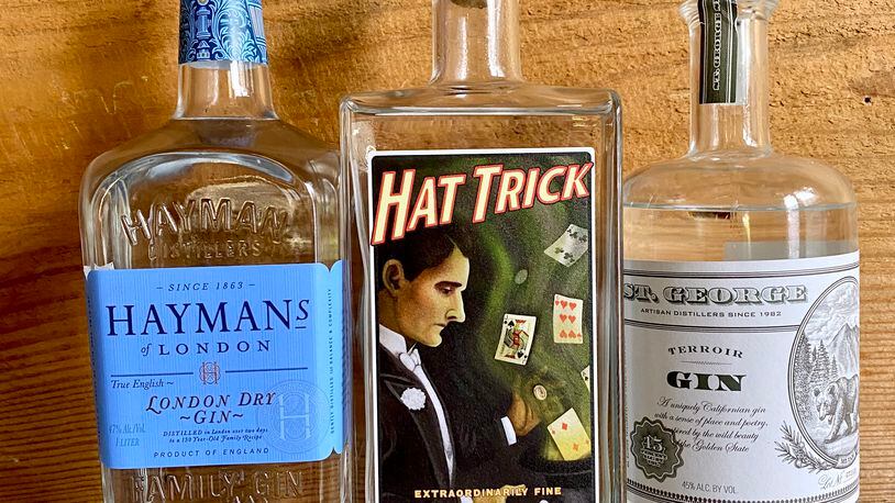 Hayman's London Dry, Hat Trick Extraordinarily Fine Botanical  and St. Georgie Terroir are three gins to consider for your home bar. Krista Slater for The Atlanta Journal-Constitution