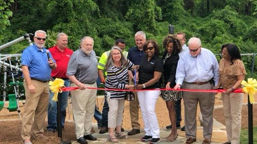 Smyrna has opened a new playground at Tolleson Park, 3590 King Springs Road, with state-of-the-art equipment for all ages. Mayor Max Bacon, Smyrna City Council members, Parks and Recreation staff and representatives from KOMPAN Inc. hosted a ribbon-cutting ceremony recently. (Courtesy of Smyrna)