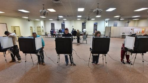 Gwinnett County residents cast their votes at First Baptist Church of Lilburn on Tuesday, November 8, 2016. HYOSUB SHIN / HSHIN@AJC.COM