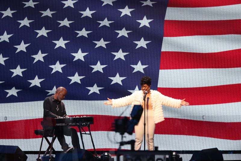 Singer Gladys Knight (right) performs the Star-Spangled Banner before the NBA All-Star game Sunday, March 7, 2021, at State Farm Arena in Atlanta. (Curtis Compton/ccompton@ajc.com)