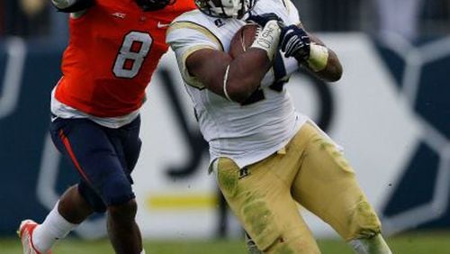 Georgia Tech running back Synjyn Days is succeeding as a former quarterback, but that hardly qualifies as unique for the Yellow Jackets. (ASSOCIATAED PRESS)