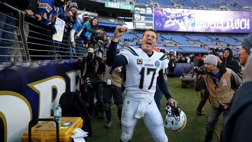 Philip Rivers  of the Los Angeles Chargers celebrates after defeating the Baltimore Ravens after the AFC Wild Card Playoff game at M&T Bank Stadium on January 06, 2019 in Baltimore, Maryland. The Chargers defeated the Ravens with a score of 23 to 17.  (Photo by Rob Carr/Getty Images)